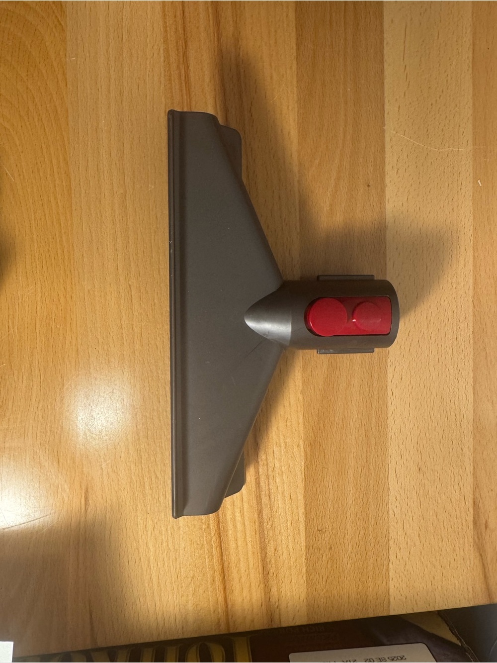 Dyson Gray Floor Brush Head with Red Buttons